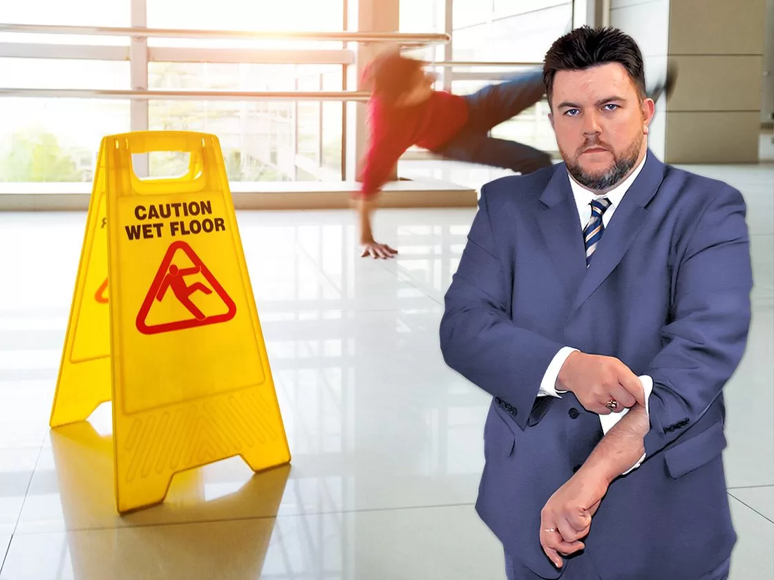 Ron Sholes, Jacksonville slip and fall lawyer, at a hazardous property scene.