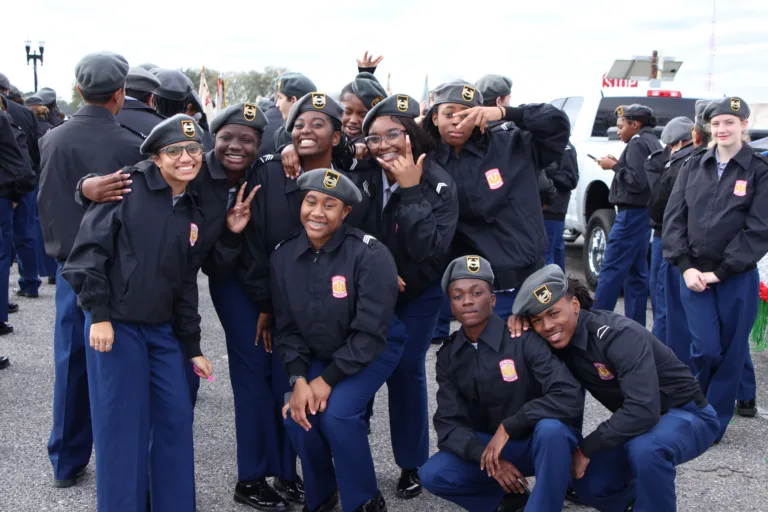 JROTC students pose at Jacksonville MLK Day Parade, supported by Ron Sholes personal injury lawyers.