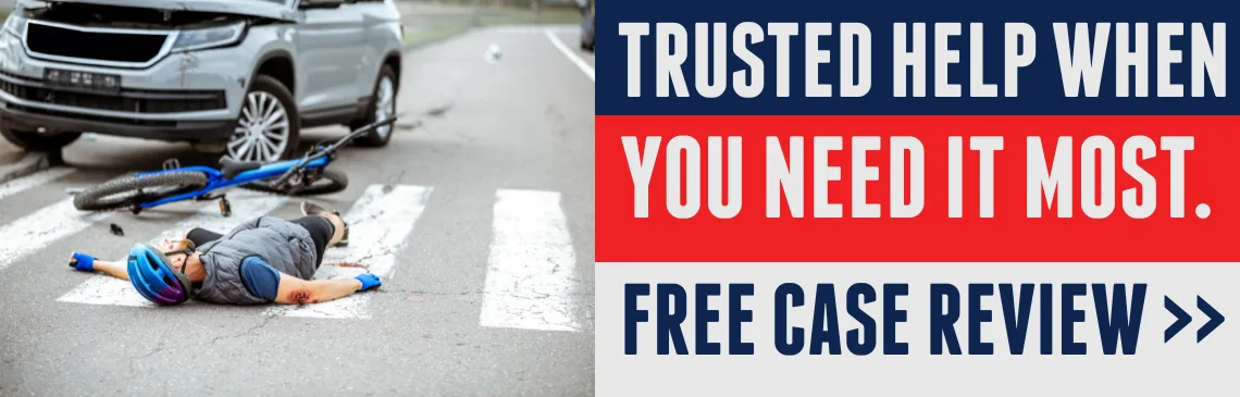 Illustration of bicycle accident, with text reading: “Trusted help when you need it most” and a link offering a free case review.
